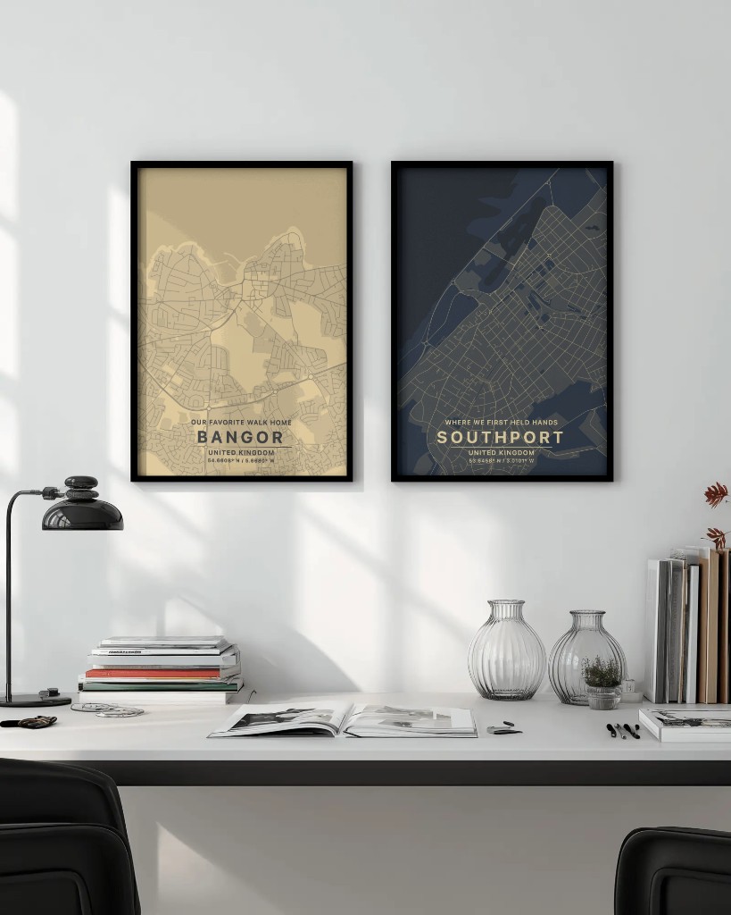 Two framed Starframer posters in a modern minimalist workspace